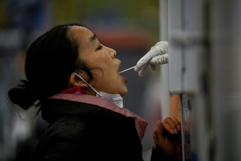 China reporta récords diarios de Covid-19. Foto: AFP.